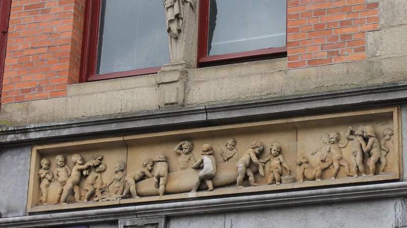 Decorative architectural details on an Amsterdam canal house